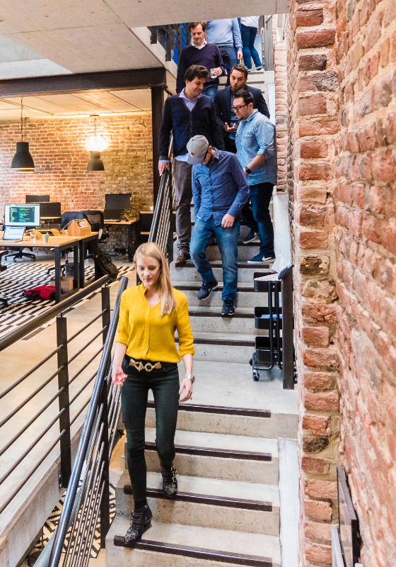 Team on office stairs